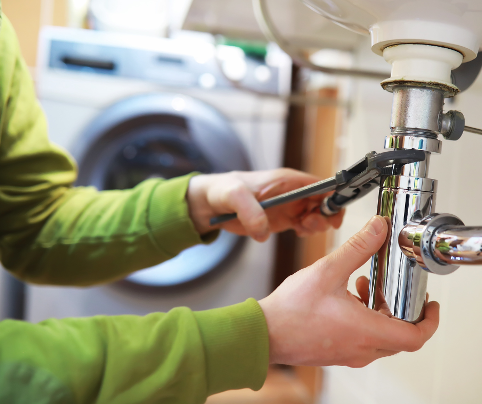 woman in green shirt plumbing